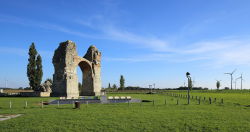 sixpenceee:  A clever way to show how ancient ruins look like. This place is Heidentor (Heathen’s Gate) in Carnuntum, an old Roman camp in Austria.