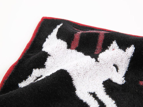 Fluffy handtowel depicting Inari shrine foxes (seen on)