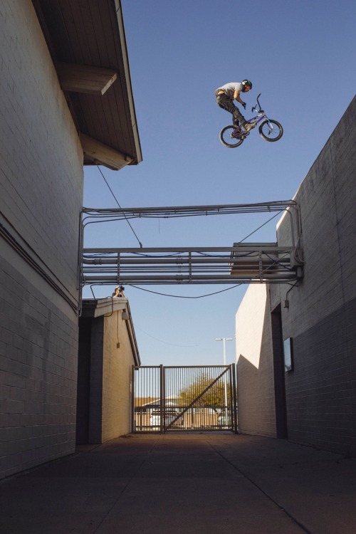 vansbmx:  Scotty Cranmer going roof to roof and throwing the bars in between at a school in AZ. This