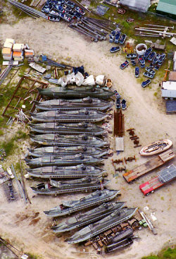 adventurelandia:Photos taken of the 20,000 Leagues Under the Sea attraction after the ride was shut down in 1994. The lagoon was left in place for years, with most of the ride props still in place, until it was finally drained in 2004.