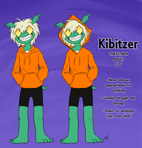 Two versions of Kibitzer standing, one with their hood up and one with it down.  They're grinning wide.  Next to them, there is text that reads: Kibitzer. They/them. Adult. 5'0". Never dresses appropriately for anything. Gremlin through and through. Down for anything (yes, even that).