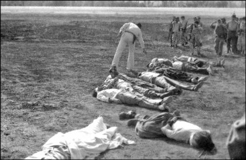 chasing-rose:  The Pulitzer Prize winner photographs, Iranian revolutionary guards executing Kurds. The 11 men were executed on august 27, 1979 at the Sanadaj Airport. (Last Photograph) Among the 11 people executed at Sanandaj Airport was this injured