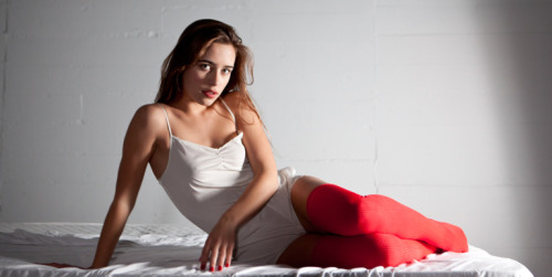 americanapparel:  Lera, wearing the Silky Romper and Cotton Solid Thigh-High Sock, Fall 2011. 