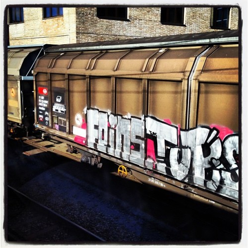 lettersfromtitan: Graffiti on a cargo train.  This train was waiting to pick up cargo at the ba