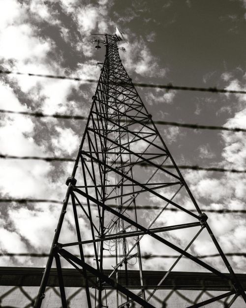 Day 153 of 365 - Into the Sky #tower #microwave #vhsradio #barbedwire #clouds #bnw #bnwphotography #