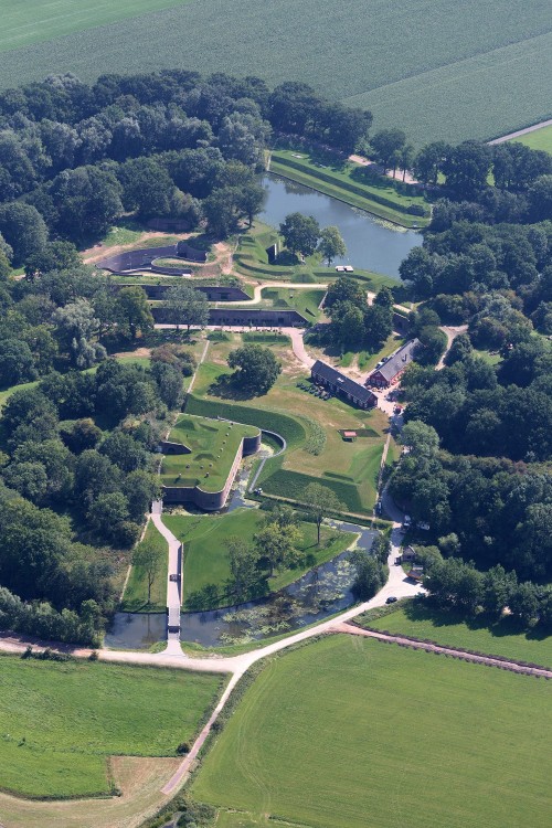 architectureofdoom:  Waterliniemuseum Fort bij Vechten, Bunnik, the Netherlands. A former fort that was part of the Nieuwe Hollandse Waterlinie, turned into a museum by West 8, Jonathan Penne Architecten and Anne Holtrop.
