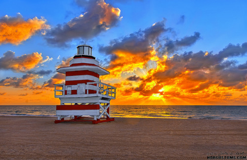 Fire bursting sunrise over lifeguard stand at Miami Beach by HDRcustoms (very busy) on Flickr.