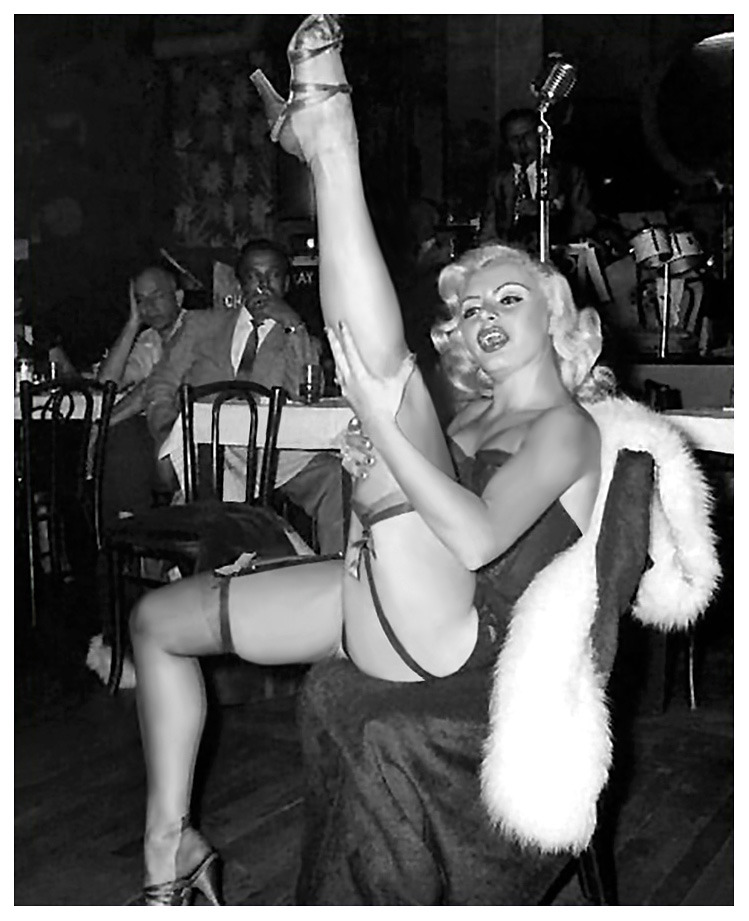 Rita Grable kicks up a shapely leg, during a performance at an unidentified 50’s-era