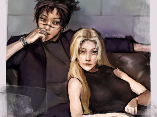Choso and Yuki from JJK sitting on a couch. Yuki is nestled against Choso's left side and is staring at you with a slight smile on her face. Choso's left arm extends behind her on the back of the couch, and he has his right arm up by his face with his fingers pressed against his lips. His head is tilted towards Yuki and he's looking in her direction with a somber, distant expression. They're both wearing evening attire. Choso has a dark purple suit jacket on over a gray shirt, and Yuki is wearing a dark maroon, nearly black, sleeveless dress. 
