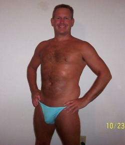 dadchaser63:  …Dad back from vacation, showing off his tan…you just see his penis bulge…