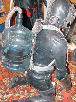 rubberworkie: rubberdom2000:  Wherever slaveRubbergimp goes, it can’t escape the bubble bottle!  Fuck hell yeh 