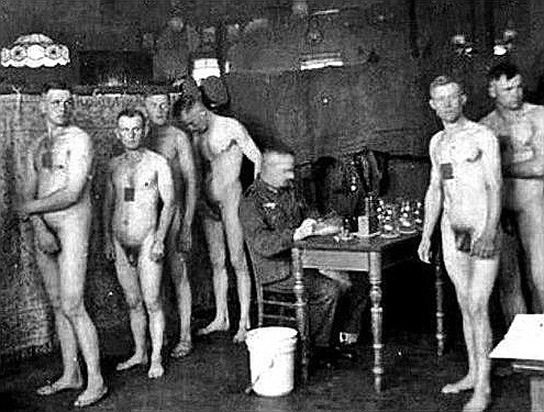 vintagemusclemen: Queuing up for a medical exam in Germany.  The glass containers on the table and t