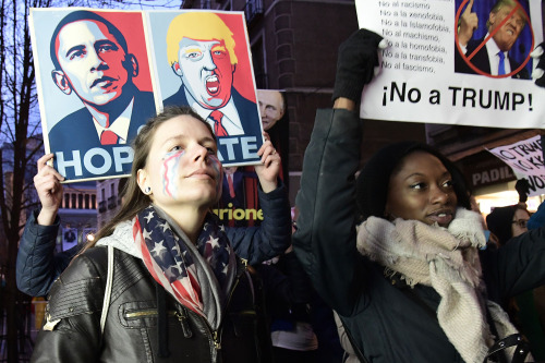 yahoonewsphotos:Protests worldwide against the inauguration of Donald TrumpA banner reading “Build b