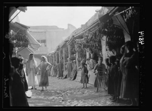 sniper-at-the-gates-of-heaven:a shoe market in mosul, 1932