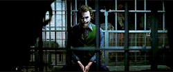 thorodinson: Heath Ledger improvised when he started clapping inside his jail cell in a mocking and sardonic capacity as Gordon is promoted. The clapping was not scripted but Christopher Nolan immediately encouraged the crew to continue filming and the