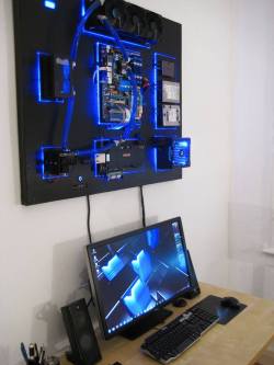 scificity:  Wall-mounted water cooled PC