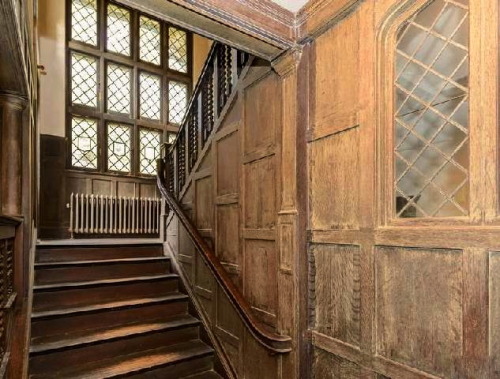 thefoodogatemyhomework: Wonderful Jacobean style paneled stair hall with barley twist spindrels and 