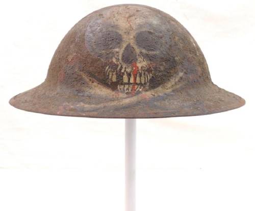 historyarchaeologyartefacts:WW1 U.S. Army Helmet with skull trench art on the front [1100x908]Source
