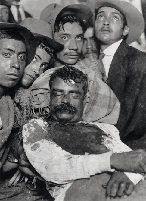 historicaltimes:  The body of Emiliano Zapata on display after his assassination, Cuautla, Mexico, April 10, 1919 via reddit