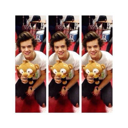 Harry with a cuddly tiger&lt;3 on We Heart It. http://weheartit.com/entry/81936350/via/n3yshawash3r3