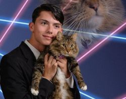 dogsandtheirbuddies:  Draven Rodriguez, a student at Schenectady High School in upstate New York, has a dream for his senior yearbook: that it will include this professional photo of him and his cat, Mr. Bigglesworth, and lasers. “I’m not trying to