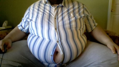 Trying on some of my button up shirts.  Kinda snug