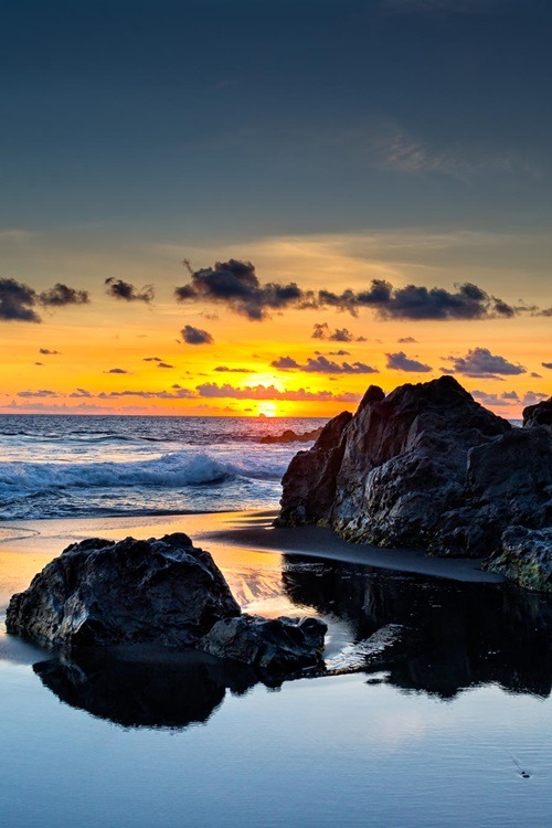 mountaineous:Wild beach and lava rocks at sunset | Julien Boé