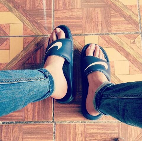 Men in slides and flip flops