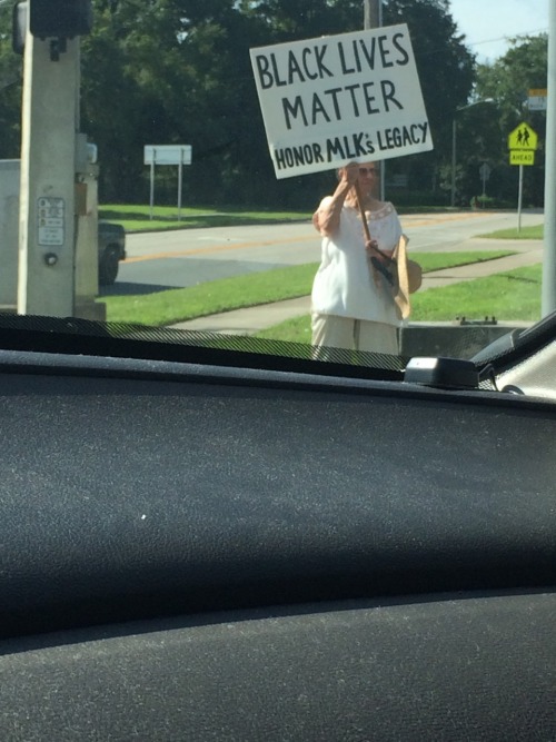 coolbreathofashes:  blackx-cellence:  ​it was nearly 100 degrees outside today in Florida and this old white lady was standing alone on the corner holding this sign.  Bless her old soul, that is love. 