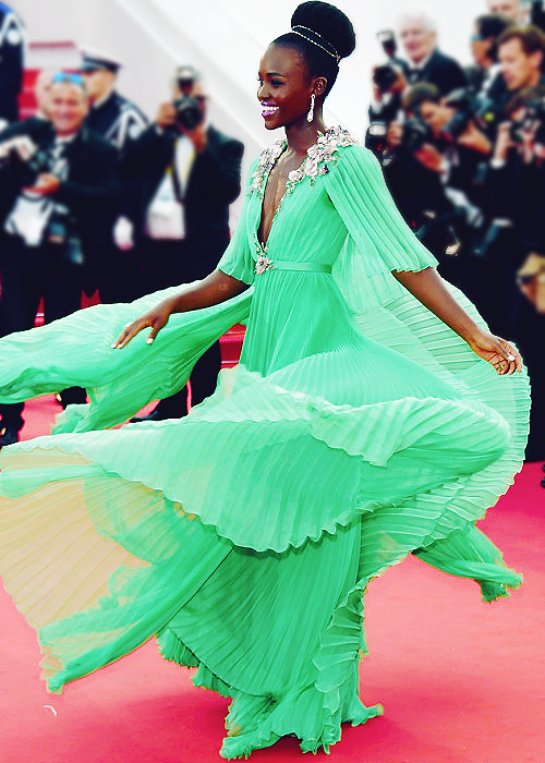 poisonedfreckles:  Lupita Nyong’o attends the opening ceremony and premiere of