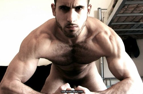 barebearx:  domworship:  This Angry Hunk is naked and furious! Paulo is absolutely furious with you! Yes, he’ll show you his muscular body, his throbbing veins, his hairy chest and his big uncut cock. But when this is all over, you better watch your