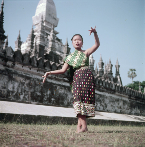 Schoolgirls in Laos performing traditional dances, 1955(via Library and Archives Canada)