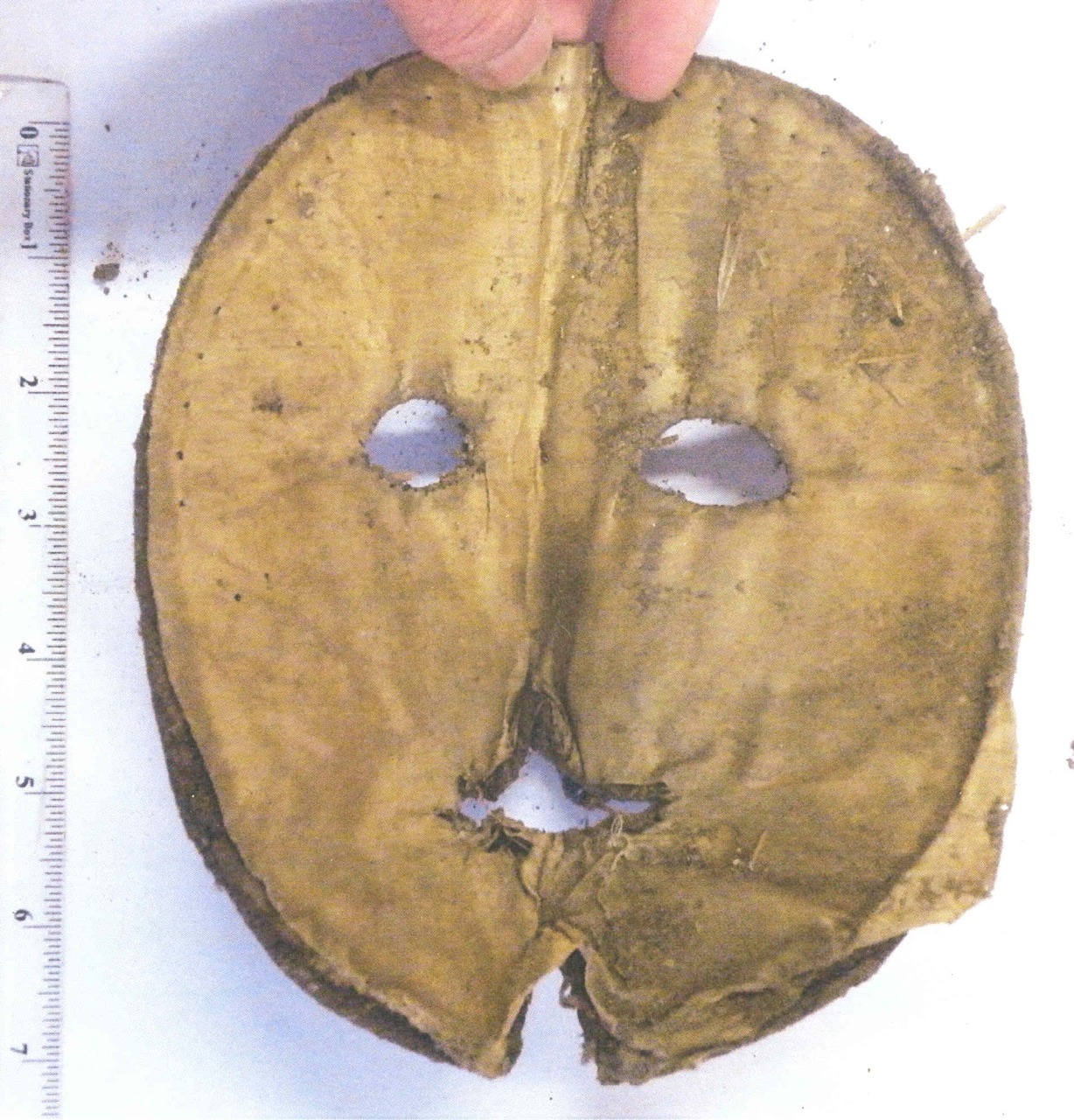 erikkwakkel:  Spooky mask discovered in wall This object is not a book, but it’s