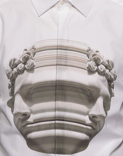 wgsn:  Neil Barrett swapped lightning bolts and pixel plaids for stretched statue heads as his signature graphic for S/S 15 