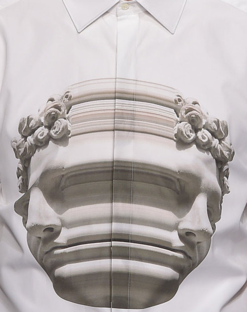 wgsn:Neil Barrett swapped lightning bolts and pixel plaids for stretched statue heads as his signatu