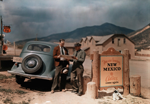 A tourist stops to get directions from a cop in New Mexico.Photograph by Luis Marden, National Geogr