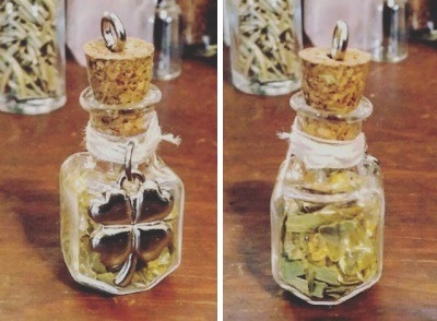 orriculum:jar spell for luck  combine in jar:citrinedried clover bless bottle with rain water. seal 