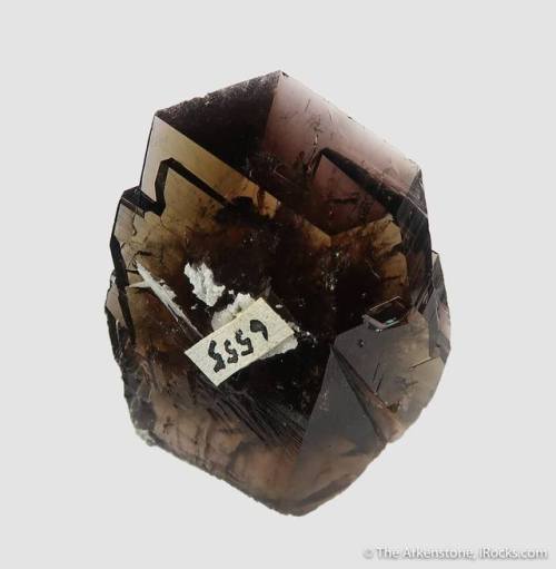 AxiniteThe rare mineral group known as axinite grows in beautiful bladed axe like crystals that are 