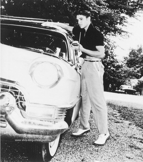 candidelvis:  Elvis and his Cadillac.  Taken at his home on Getwell Road in Memphis,
