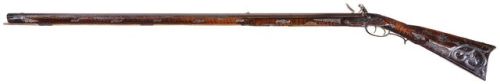Extraordinary silver mounted flintlock long rifle crafted by Abraham Johnson of Harrison Co. Ohio, e