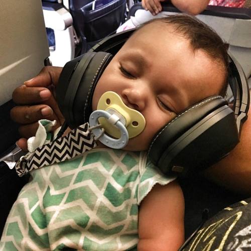Music soothes the crying baby on a plane so passengers won&rsquo;t stab us. #daddygameproper