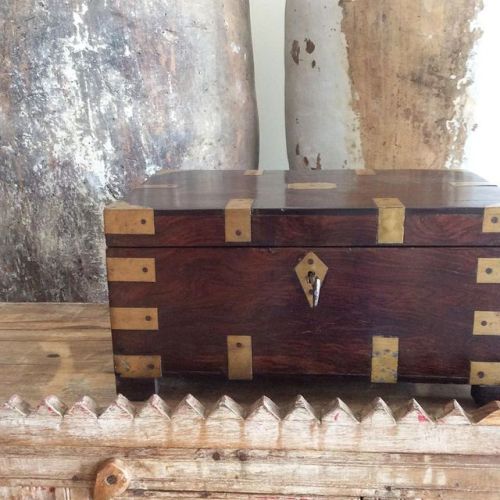 Old Rosewood Cashbox from a merchant in India. Campaign style brass corners. Find more about it in o