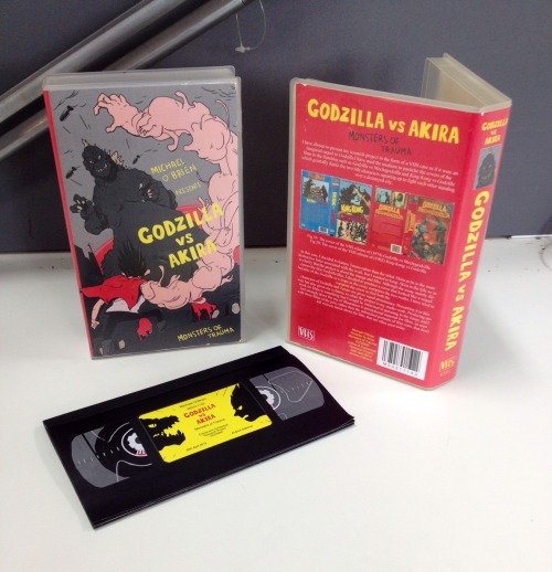 mikeob:  I handed in my dissertation today! Here’s a photo of the design work I did for it and the front cover. 