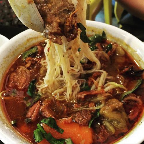 Cold night, spicy Vietnamese beef stew with soft rice noodles. The dish is warmed by chili, pepper, 