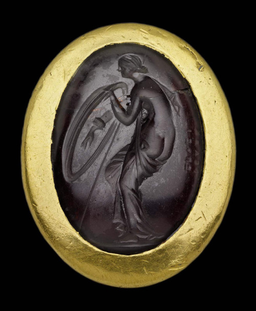 theancientwayoflife:~ Ring with oval gem with armed Aphrodite.Culture: GreekPeriod : Hellenistic Per