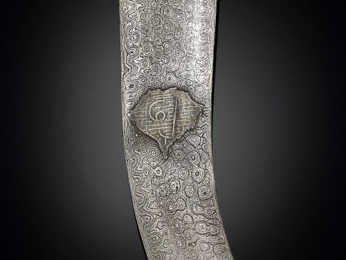 art-of-swords:  Jambiya Dagger Dated: 19th century Culture: Moroccan Measurements: Overall length: 14”; blade length: 8 1/4” This particular dagger features a beautifully detailed silvered hilt and scabbard, which protects the fine Damascus steel