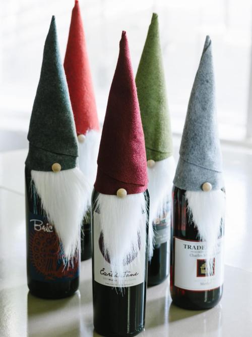 DIY Felt Elf or Gnome Wine Bottle Cover Tutorial from HGTV. The instructions under the photo were cu