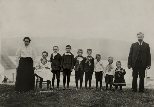 An informal group portrait of a family with nine sons in Nova Scotia, Canada, March 1916.Photograph 