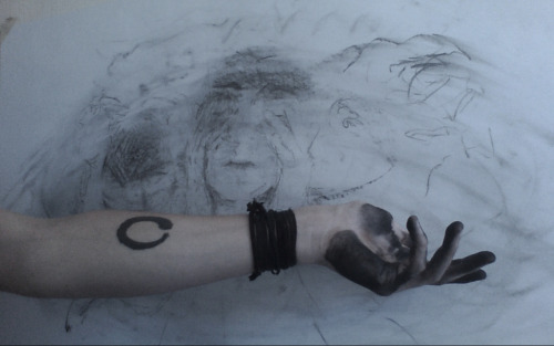 xiza:  rk45:  I started this drawing but it wasn’t going well and I got too frustrated so I smudged it up and then later ripped it up. But I thought the charcoal smudges on my hand were pretty neat   follow for similar posts