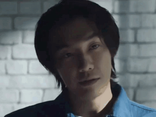 do-young tilting his head looking at something off camera